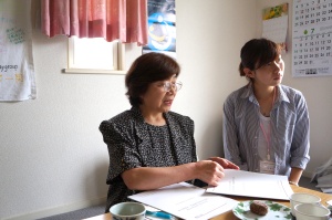 Ishida-san and her assistant, Yuri Sanpei, seated at their cozy "office" table.